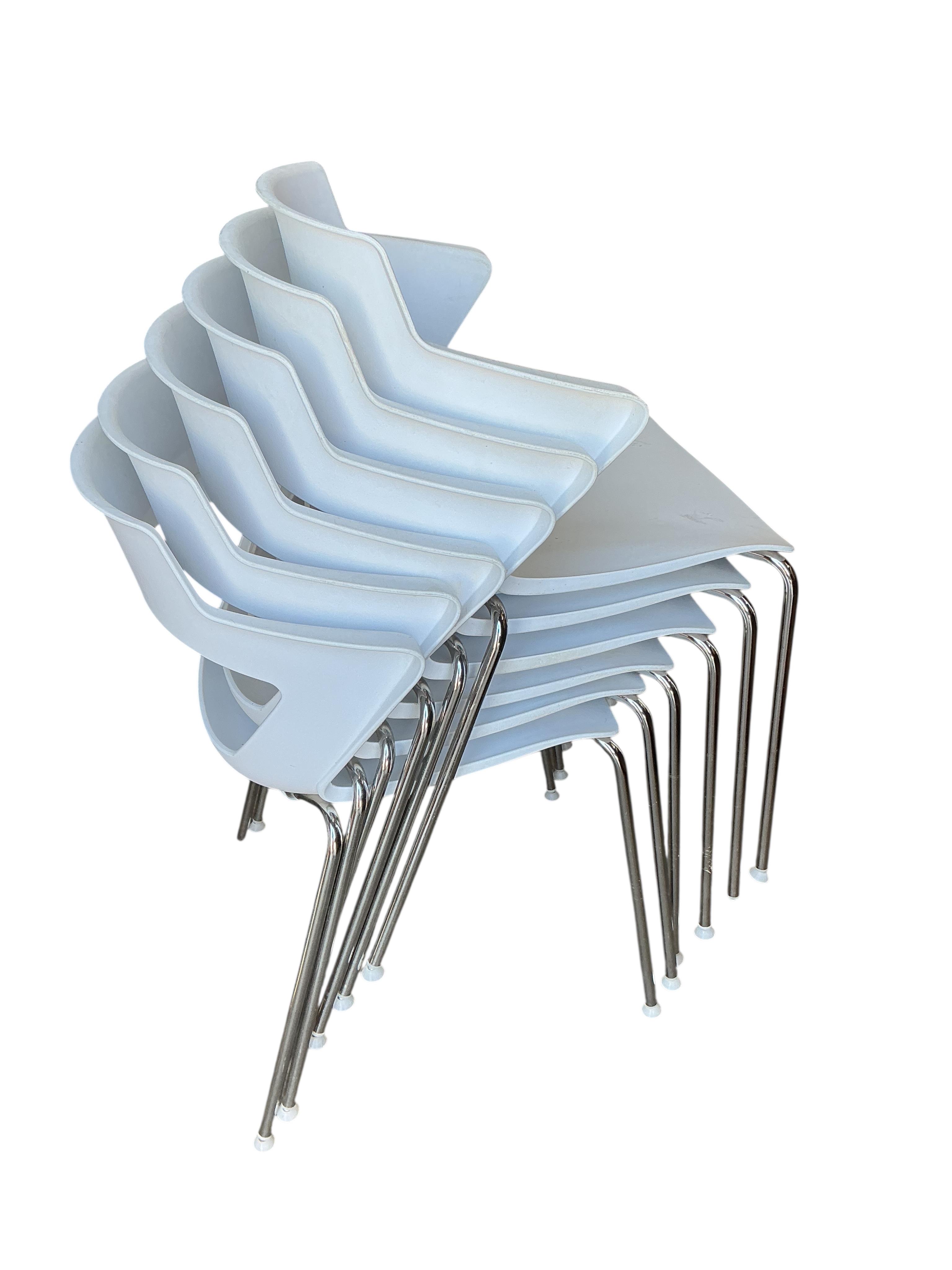 Paolo Lucidi and Luce Pevere for Elite, a set of six white stackable office chairs, width 55cm, depth 45cm, height 80cm